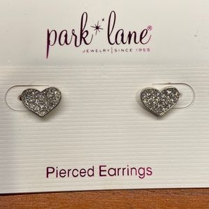 Crystal hear pierced earrings by Park Lane. Silver tone